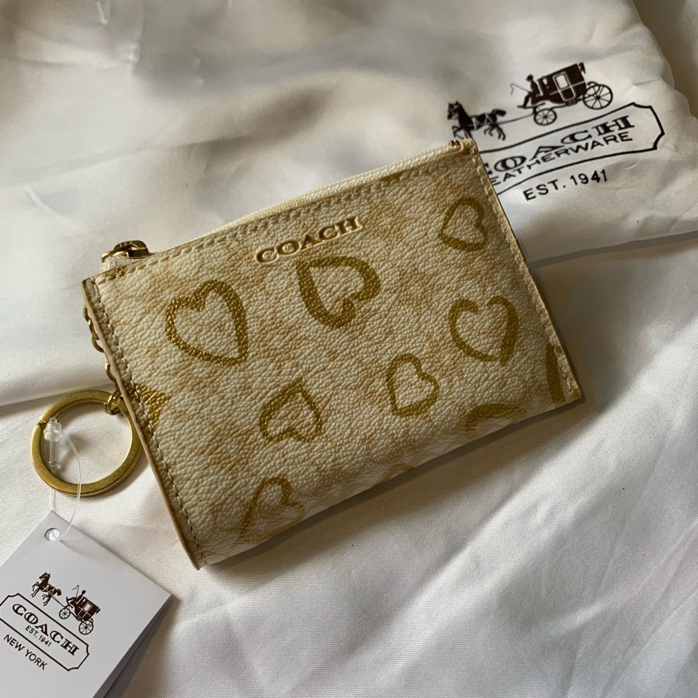 BRAND-NEW gold coach coin purse